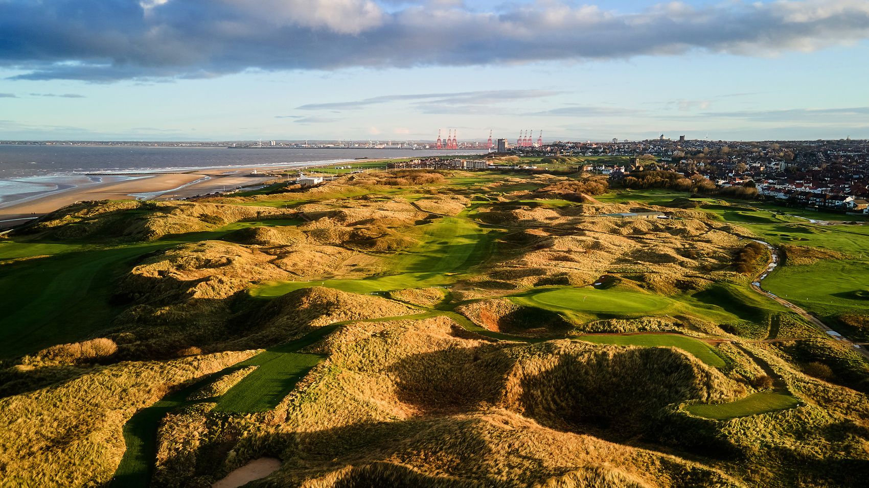 Aerial view of Wallasey's links, dunes running down to the Mersey estuary
